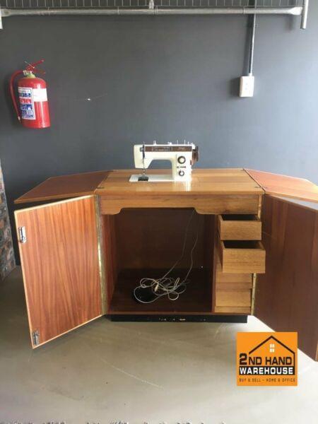 Empisal Pacestter Sewing Machine on stand