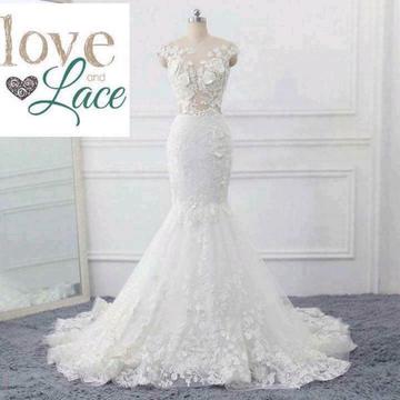 Breathtaking wedding dress in stock