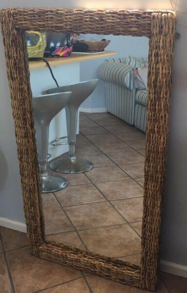Bar chairs, bedside tables and a wicker framed mirror