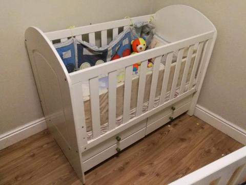 Baby cot with built in drawers