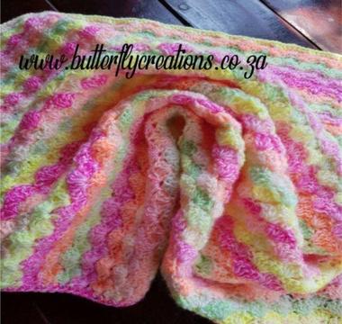 Hand knitted and crocheted baby blankets, shawls and jerseys