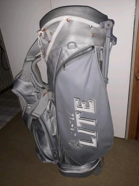 Castle Light golf stand bag with harness and rain cover.  