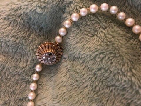 Family Heirloom Double strand cultured pearl necklace with diamond and gold clasp 