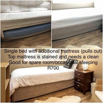 Single bed with pull out mattress  