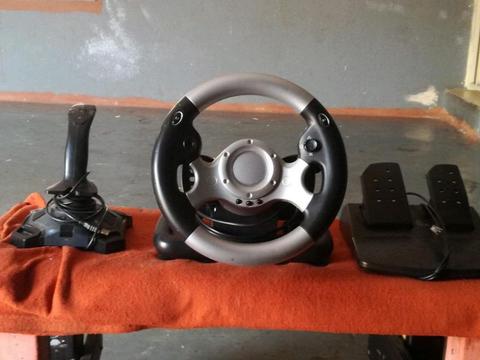 Racing steering wheel and pedals and gear handle 