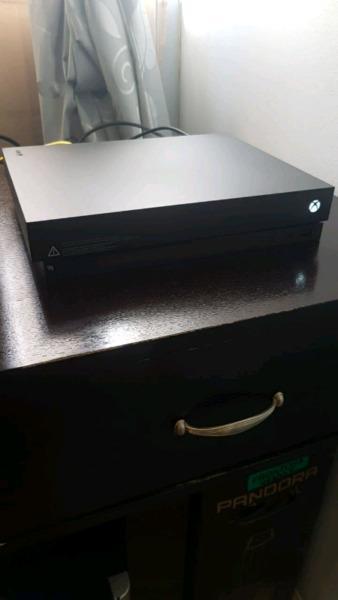 XBOX ONE X FOR SALE WITH A CONTROLLER AND NFS 
