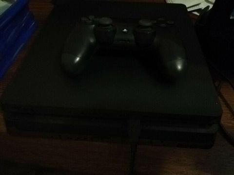 Playstation 4 with 1 remote and 4 games 