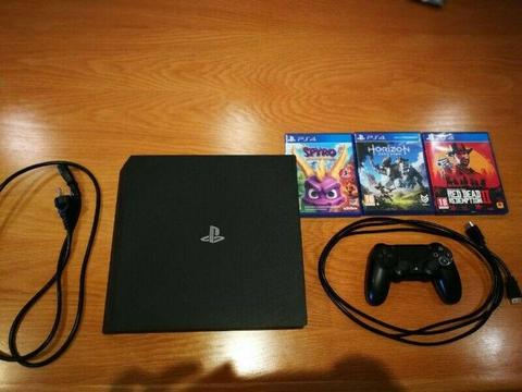 PlayStation 4 Pro plus 3 games 