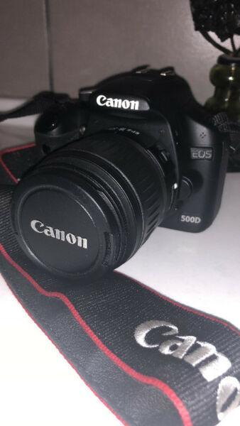 Canon EOS 500D Digital SLR with EF-S 18-55mm f/3.5-5.6 IS Lens , WALL CHARGER , SHOULDER BAG AND 8 