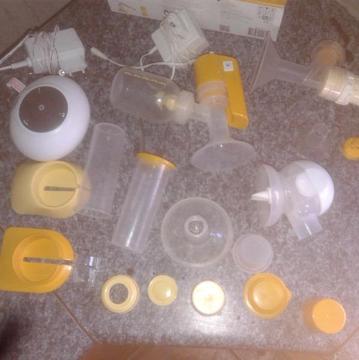 New medela manual breasrpump set wit 2 mini elecric pumps 