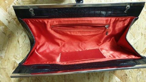Black Woolworths clutch with red interior for sale! 