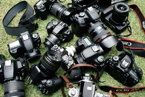 Various quality USED CANON cameras and lenses for sale. 