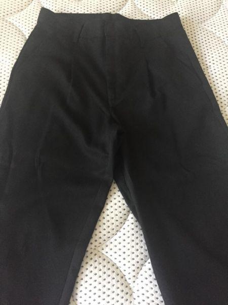 Boys black Woolworths trousers age 11-12 