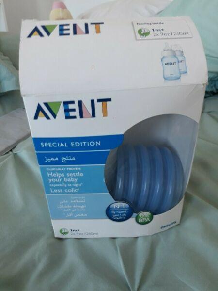 10 Avent bottle containers for storing milk 