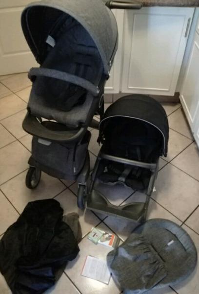 Stokke explory pram with an extra replacement seat 