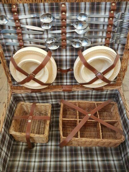 Used- Large wicker picknic basket with accessories . We buy and sell at moorebuyandsell 