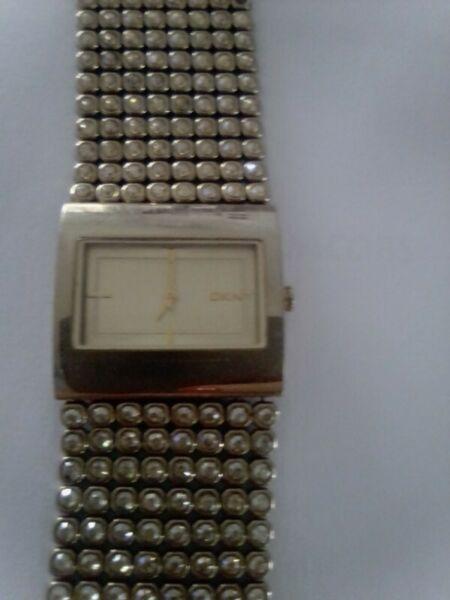 DKNY gold watch with diamante. Needs new battery. 