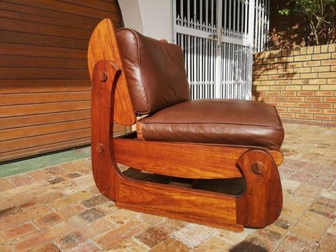 Akia Lounger Chair Akia-wood with genuine leather seating pillows Price Neg Call Bobby 0764669788  