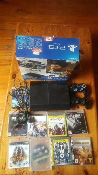 PS3 WITH 3 CONTROLS AND GAMES 1850 