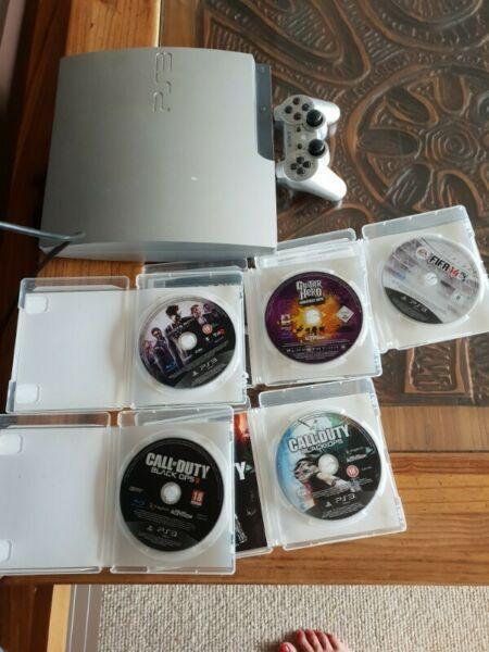 PS3 with games and console 