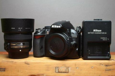 Nikon D3100 with 50mm f1.8G prime lens for sale. 