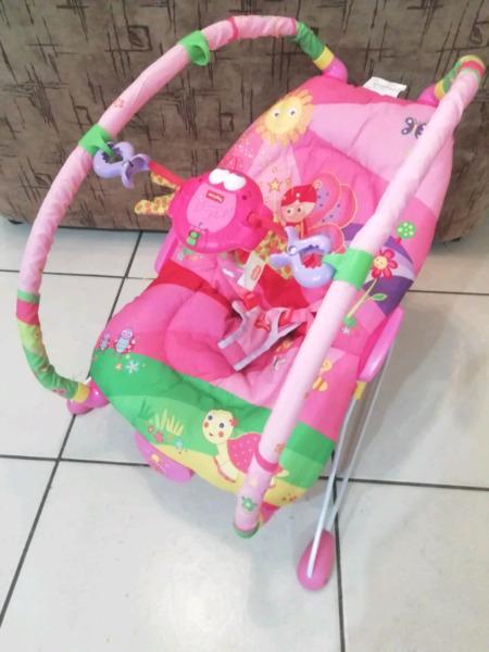 Musical.vibrating adjustable bouncer 