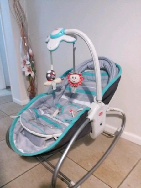 Tiny Love 3in 1 bouncer converts to crib and rocker napper, includes sounds. Turquoise. 