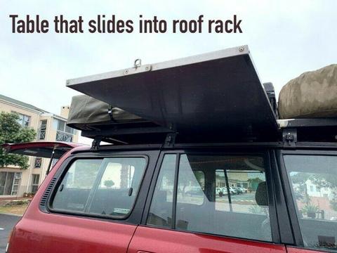 Land Cruiser 80 roof rack for sale with hi-lift jack and 2x jerrycan holders and a table 