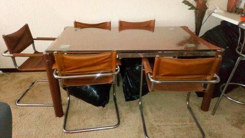 Dinning table with 6 leather chairs 