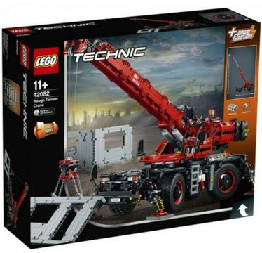 New - Technics Lego red crane - it has box damage. 