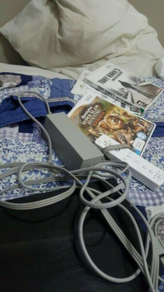 Wii console wii fitness board and 4 games R650 