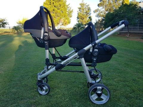 Double Trouble twin stroler with two fit in Maxi Cosi car seats and isofix bases. 