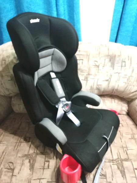 Safeway caraeat/booster seat with adjustable headrest 