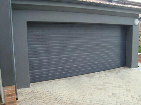 Single and double aluzinc sectional doors in Arcadia and Sunnyside 
