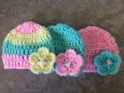 Crocheted baby hats and crowns 
