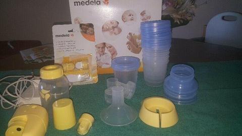 Medela Mini Electric Breastpump, with extra membranes & storage cups 