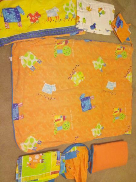 Reversible Zorbit baby cot bedding and nursery furnishings 