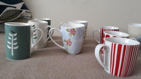 14 assorted coffee and tea mugs R100 