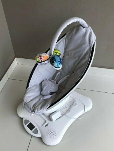 4Moms® MamaRoo®4 - infant seat bounces up and down and sways from side to side. 
