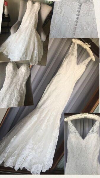 La Spousa Wedding dress Colour: Ivory Material: Lace Size: 10 / 34 Design: Ivory 