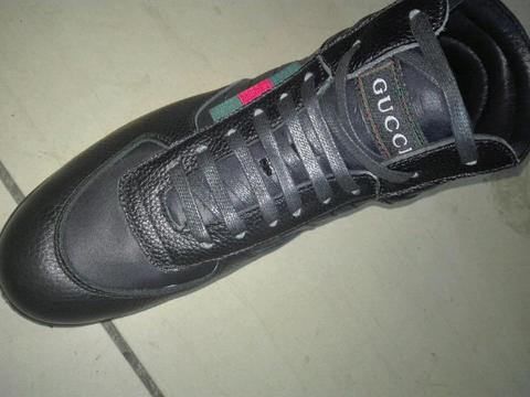 Gucci® kicks (black and white colours) 