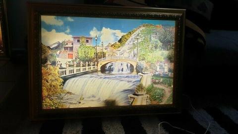 Picture frame with built in light 