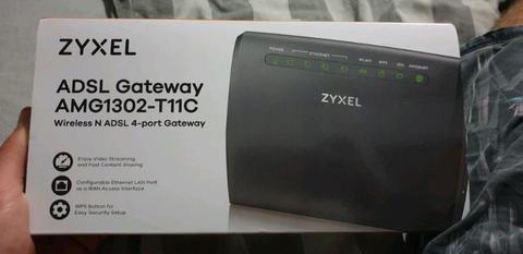 ZYXEL AMG1302 ROUTER  