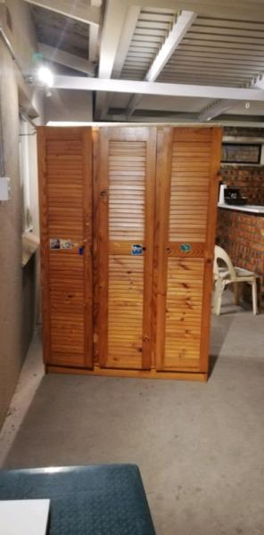Three door cupboard 